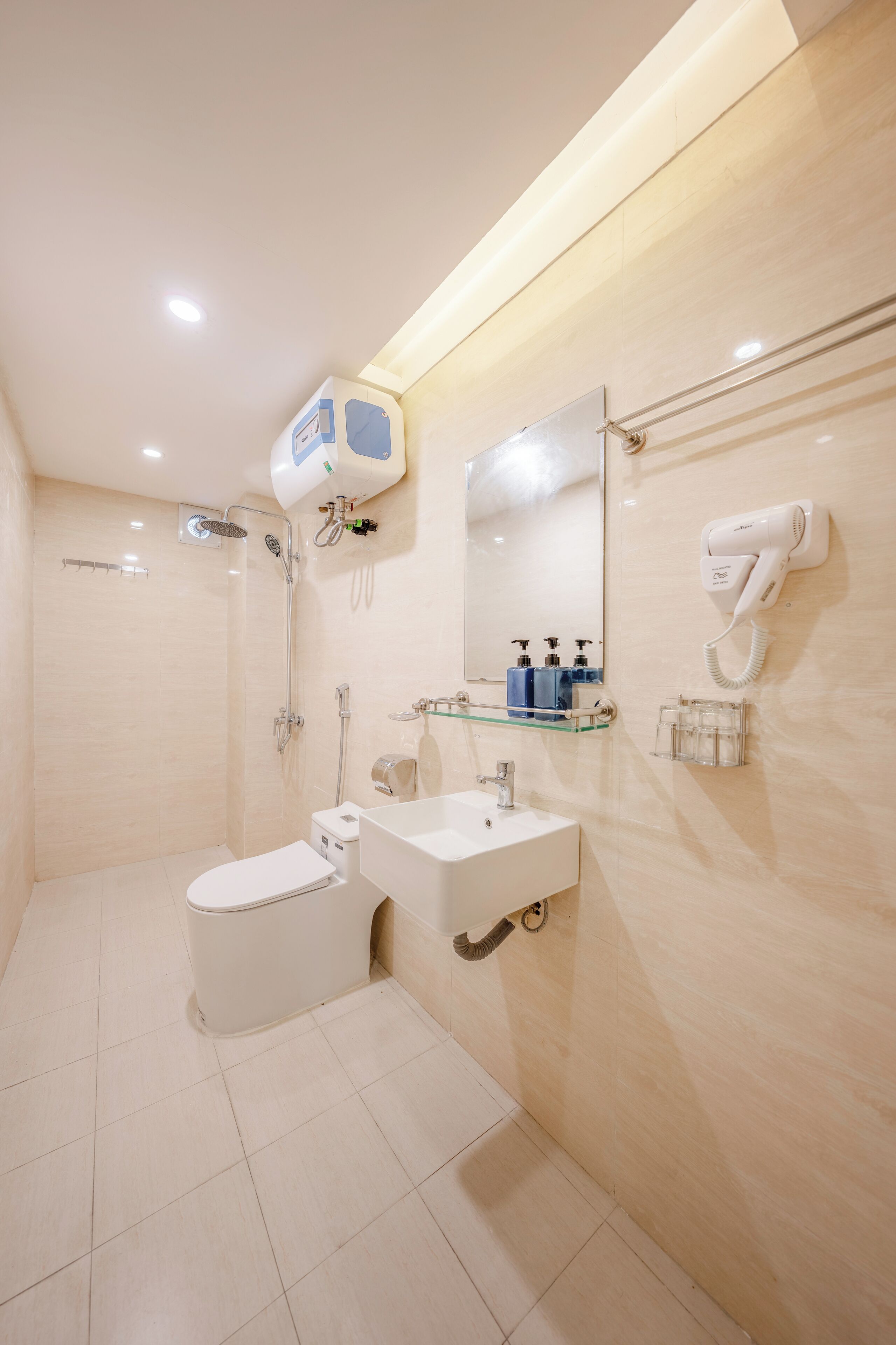 Shower, hair dryer, towels, soap