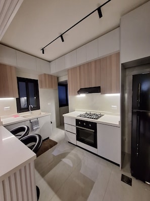 Fridge, oven, stovetop, cookware/dishes/utensils - Charming 2-Bedroom Apartment in Hamra, Beirut (Hamra)