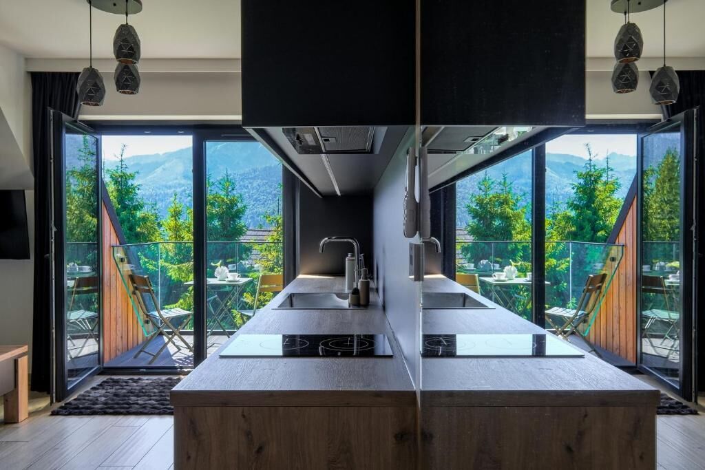 Comfort Studio Suite, Balcony, Mountain View | Private kitchen | Electric kettle, spices, cleaning supplies, freezer