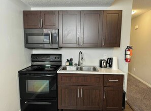 Fridge, microwave, oven, stovetop - Quiet & Comfortable 1-Bedroom (Calgary)