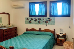 Classic Apartment, Garden View | Desk, laptop workspace, blackout drapes, iron/ironing board