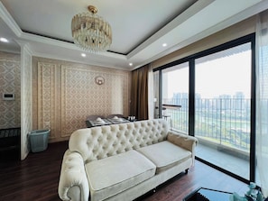 Apartment, 1 Queen Bed, Balcony, City View | Living area - Lina - Luu Tru Cong Tac Nghi Duong (Nam Tu Liem)