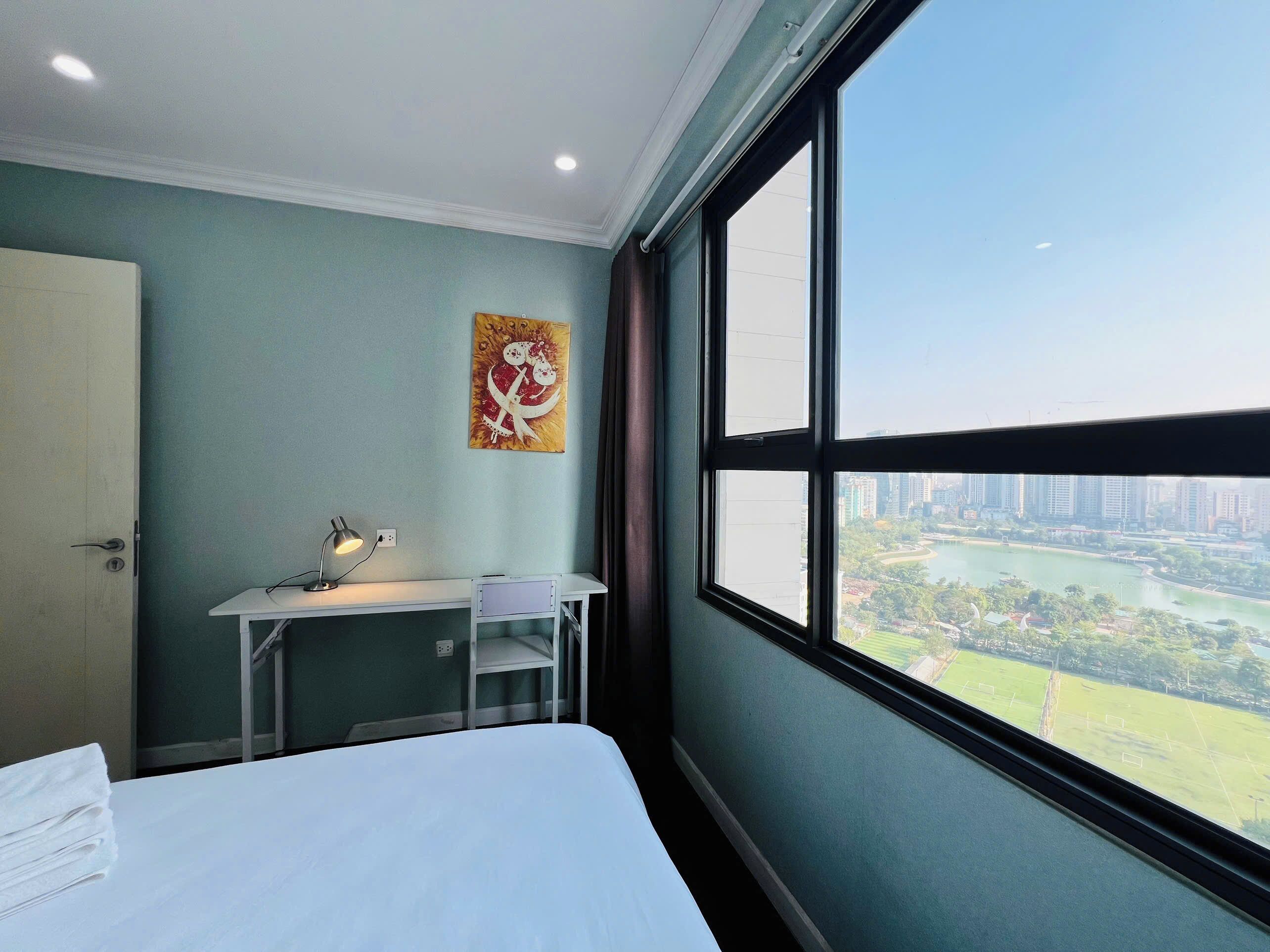 Apartment, 1 Queen Bed, Balcony, City View | Laptop workspace, blackout curtains, iron/ironing board, free WiFi