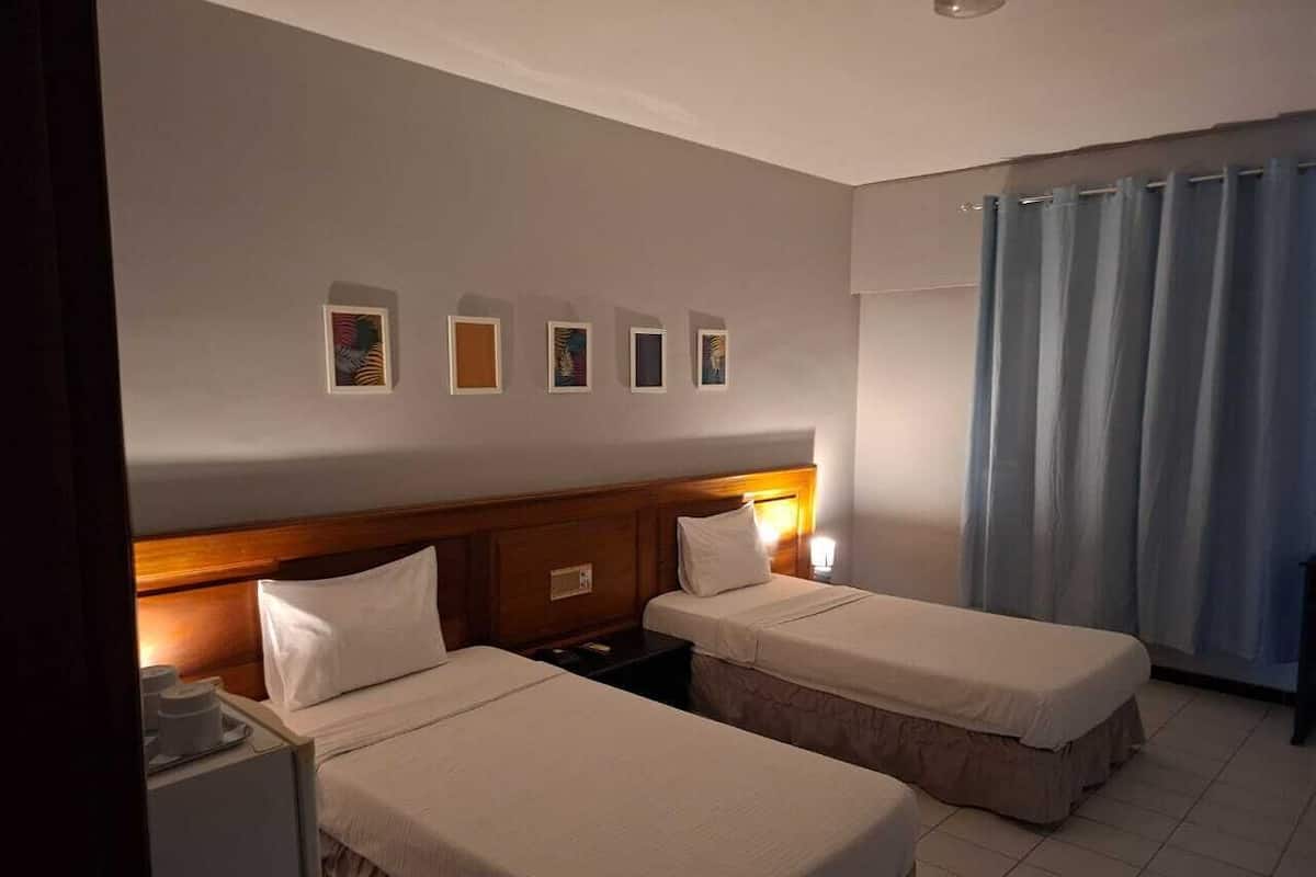 Kahden hengen classic-huone (kaksi sänkyä), parveke, kaupunkinäköala | Ilmainen Wi-Fi