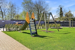 Children’s area - Family & friends - Holiday apartment family & friends: balcony, elevator & great (Norden)