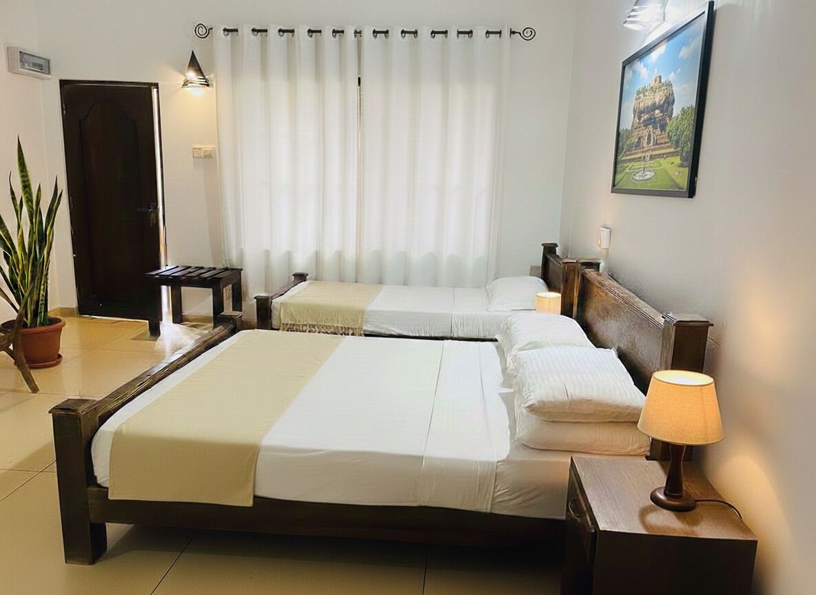 Chambre Deluxe Double ou avec lits jumeaux, balcon, vue jardin | Bureau, fer et planche à repasser, Wi-Fi gratuit