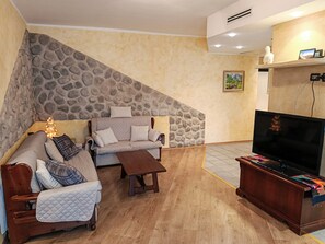 Appartement, balcon, vue ville | Coin séjour