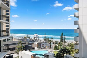 Indoor pool, outdoor pool - Cosy Ocean Views Apartment w/cinema at night. Pet-Friendly! (Surfers Paradise)
