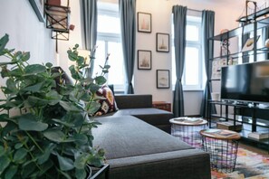 Apartment, 1 Bedroom, City View | Living room | Books - 6 min Walk to Metro - 3 Stops to City Center (Vienna)