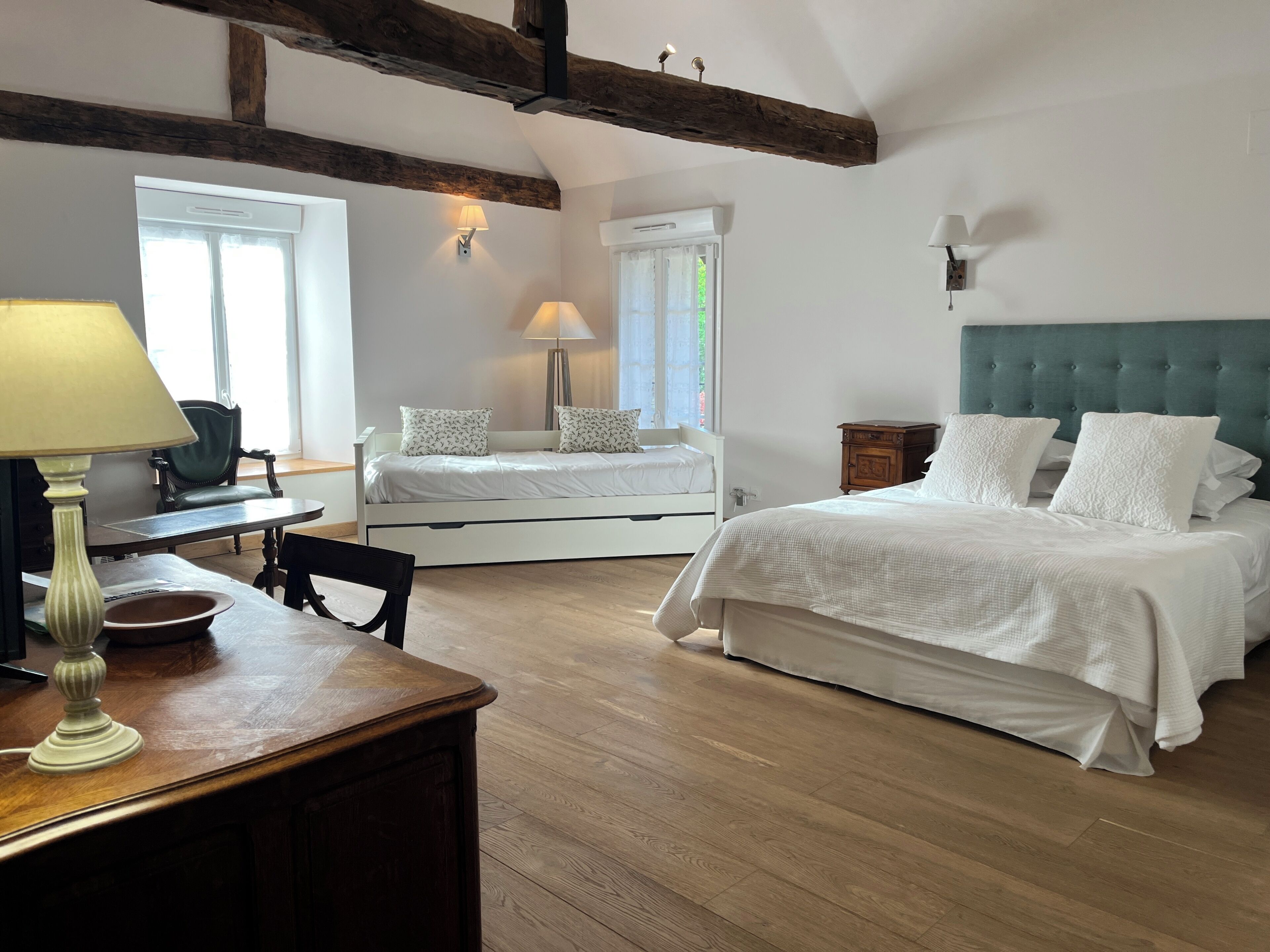 Habitación cuádruple Deluxe | Wifi gratis y ropa de cama 