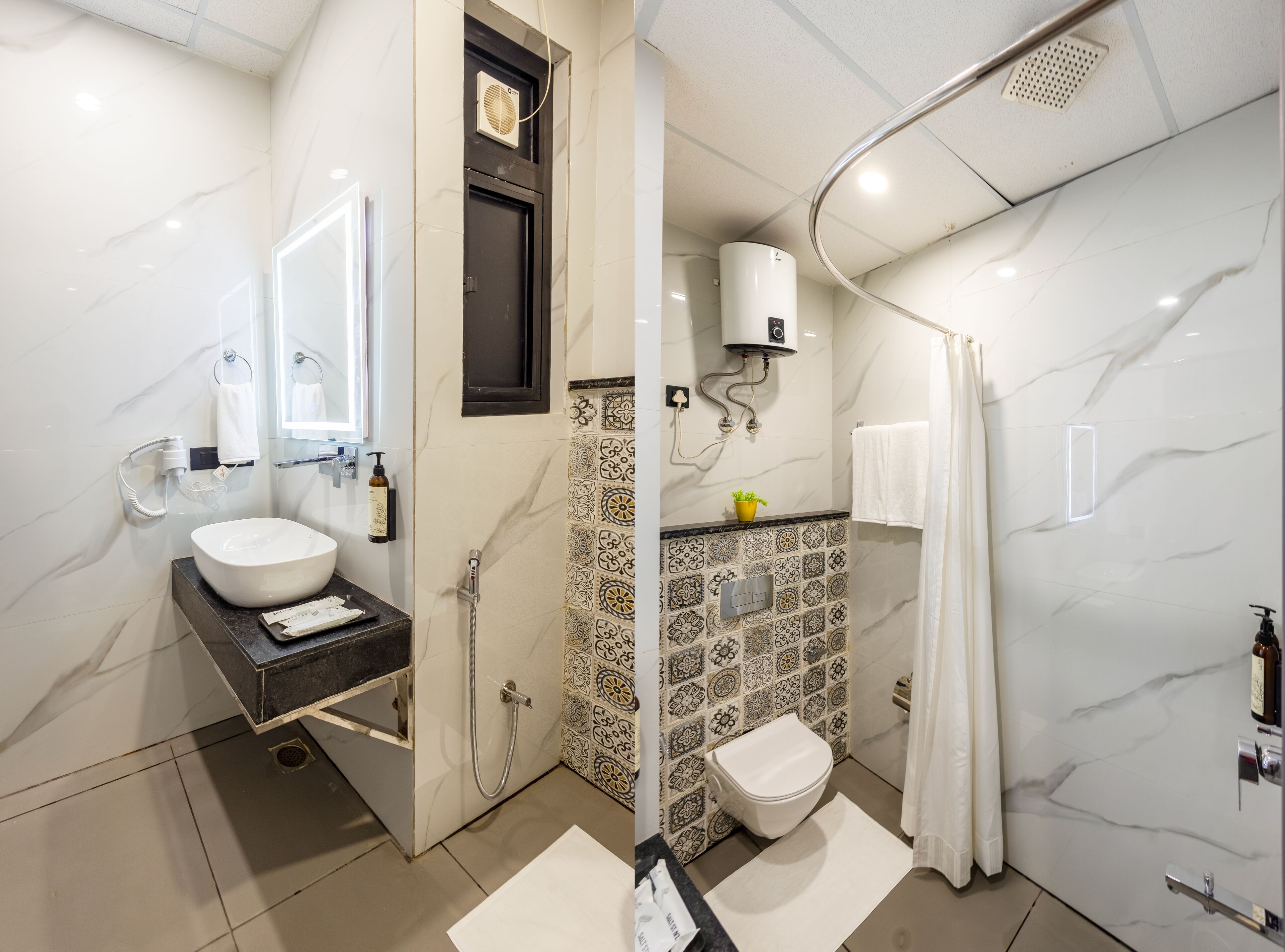 A modern bathroom with a white sink, a shower, and a toilet.