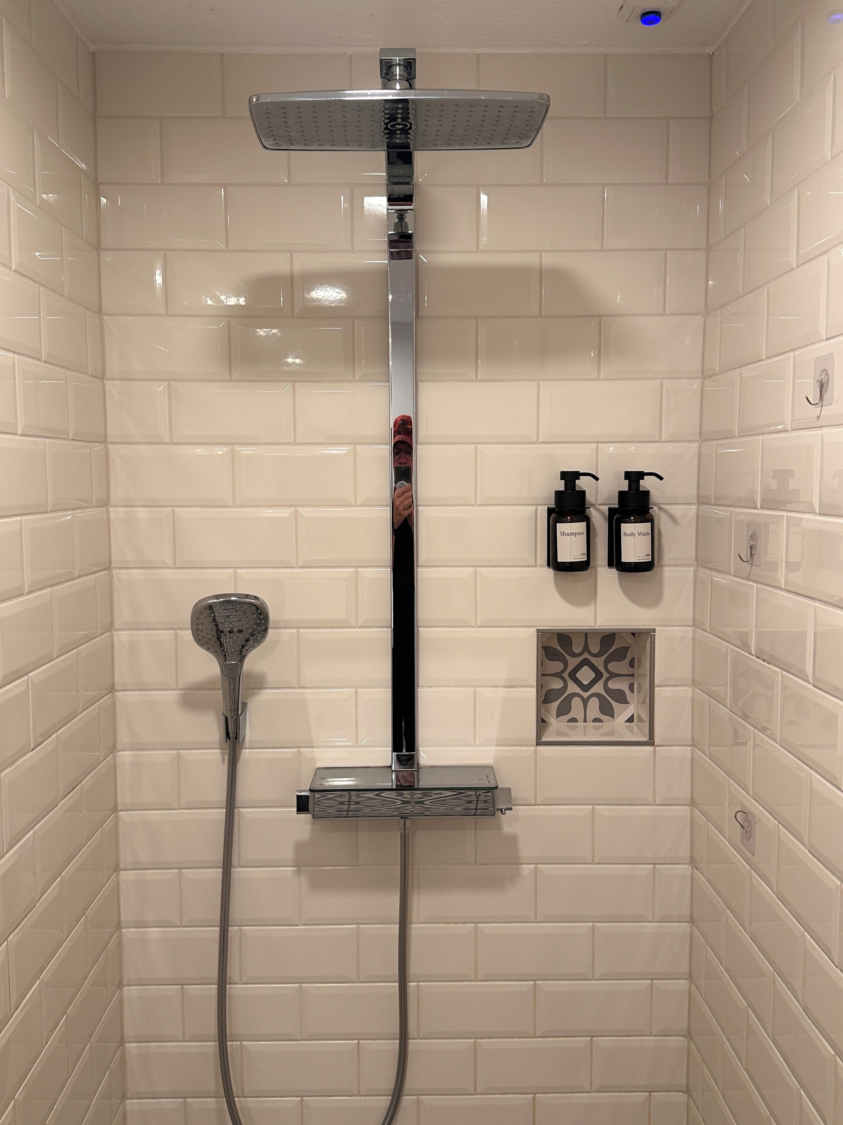 Shower, hair dryer, towels, toilet paper