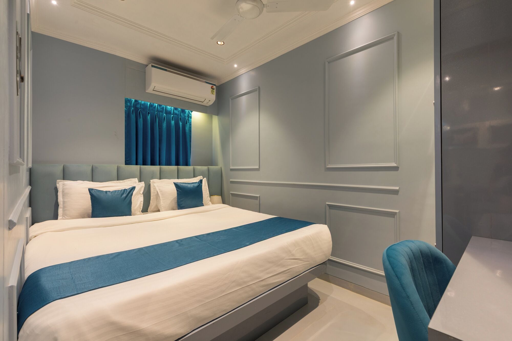 Premium bedding, memory-foam beds, desk, laptop workspace