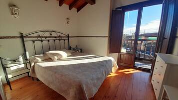 Fer et planche à repasser, lit parapluie