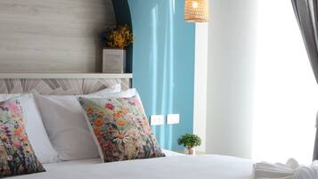 Desk, blackout drapes, soundproofing, iron/ironing board