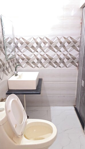 Shower, towels, soap, shampoo - VINAYAK PALACE  (MATHURA)