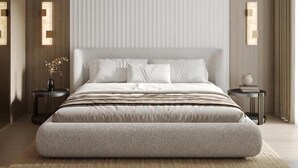 Ein modernes Schlafzimmer mit einem großen Bett, einer runden Deckenleuchte und einem minimalistischen Design.