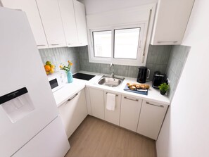 Refrigerador, placa de cocina