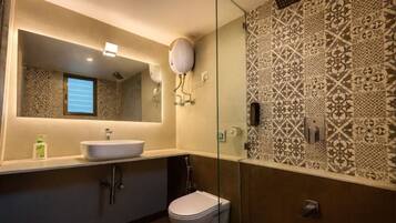 Separate bathtub and shower, hair dryer, towels, soap