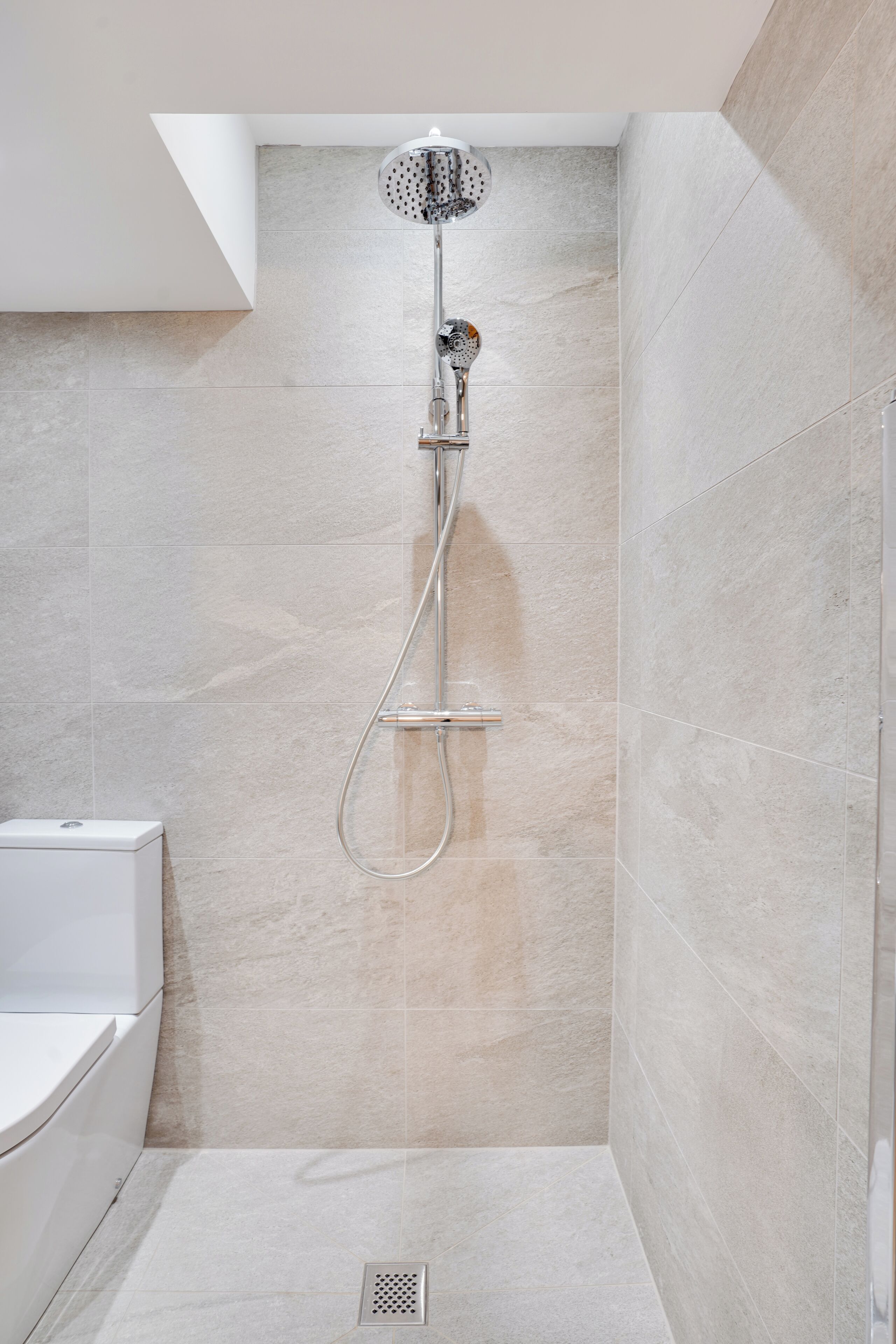 Shower, towels, soap, toilet paper