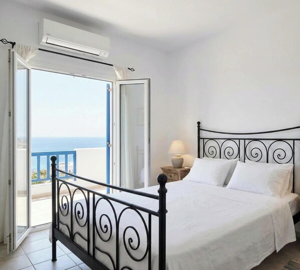 Apartment, Sea View | In-room safe, desk, laptop workspace, blackout drapes