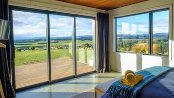 Luxury Suite, 3 Bedrooms, Mountain View | Premium bedding, blackout curtains, iron/ironing board, travel cot