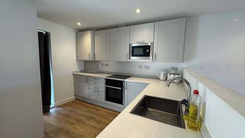 Oven, cookware/dishes/utensils