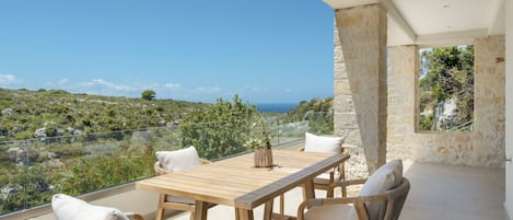 Family Apartment, Sea View | Outdoor dining