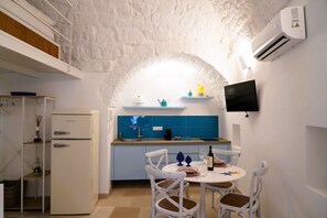 Casa panorámica, vistas al mar | Zona de estar | Una televisión de pantalla plana