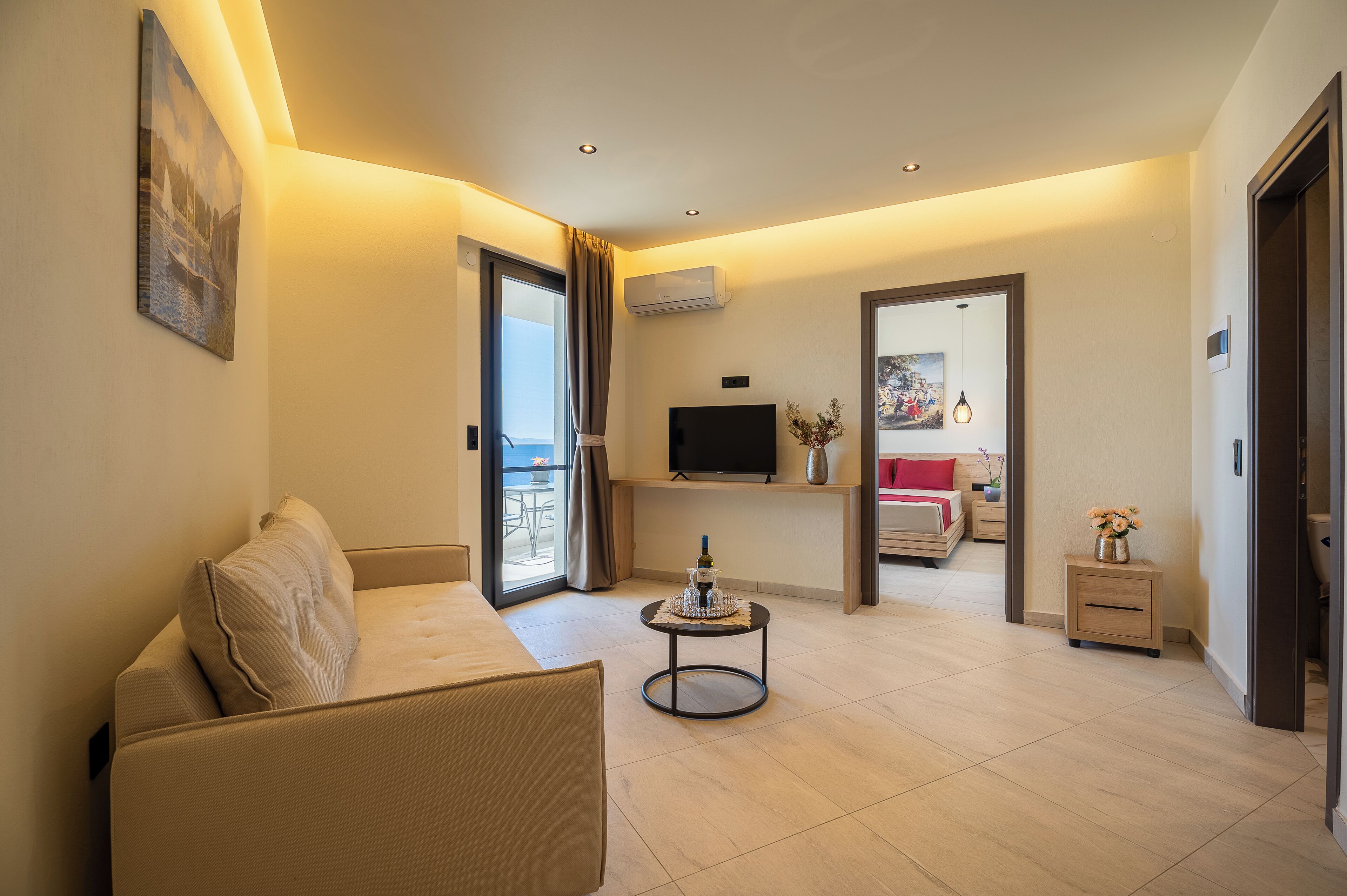 Apartment, Sea View | Living area | TV