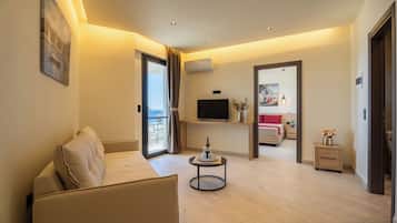 Apartment, Sea View | Living area | TV