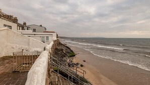 A coastal building with a staircase leading to a beach. - Appleton House | Lower Largo (Lower Largo)