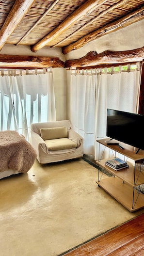 Fjölskylduherbergi - verönd - útsýni yfir garð | Stofa