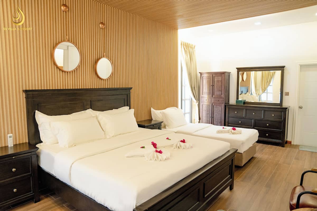 Deluxe-huvila, parveke | Tallelokero huoneessa, työpöytä, silitysrauta/-lauta, ilmainen Wi-Fi