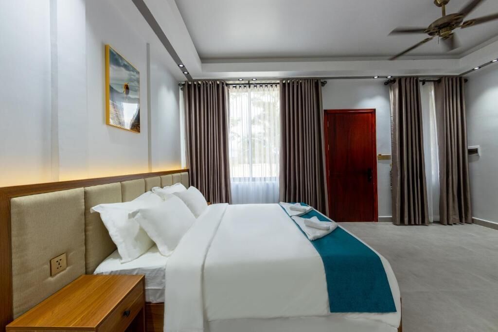 Deluxe-huvila, näköala puutarhaan | Tallelokero huoneessa, työpöytä, silitysrauta/-lauta, ilmainen Wi-Fi