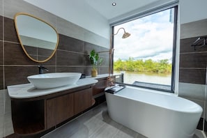 Deluxe Villa, Balcony, Lake View | Bathroom | Separate tub and shower, hair dryer, bathrobes, slippers - SS Villa Resort  (Srae Ambel)