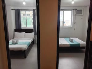 Free WiFi, bed sheets - Shandong Residences (Manila)