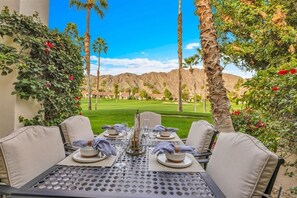 Outdoor dining - Beautifully remodeled, west-facing fairway condo in PGA West (La Quinta)