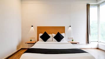 Deluxe Double Room, City View | In-room safe, desk, laptop workspace, blackout curtains