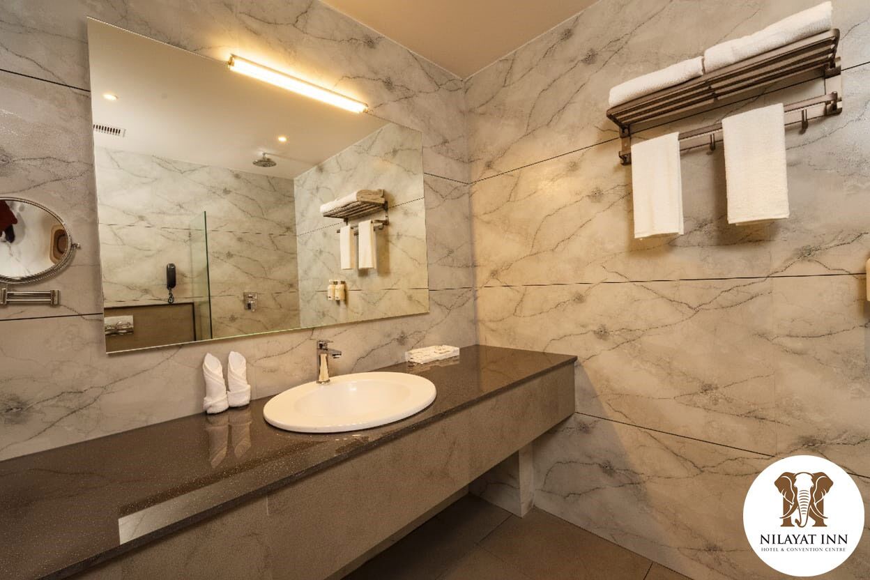 Deluxe Double Room, Garden View | Bathroom | Shower, rainfall showerhead, free toiletries, hair dryer