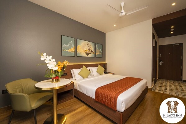 Deluxe Double Room, Garden View | In-room safe, iron/ironing board, free WiFi - NILAYAT INN (Thrissur)