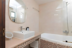 A bathroom with a sink, mirror, and shower. - Villa “1 Bedroom, Private Pool, Sea View” with Wi-Fi & Air Conditioning (Malia)