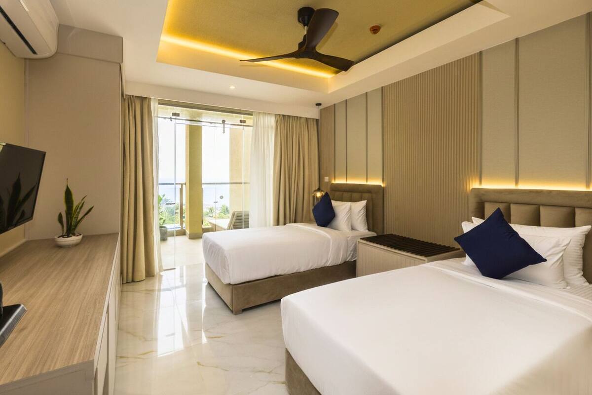 Superior Ocean View Room | In-room safe, desk, laptop workspace, iron/ironing board