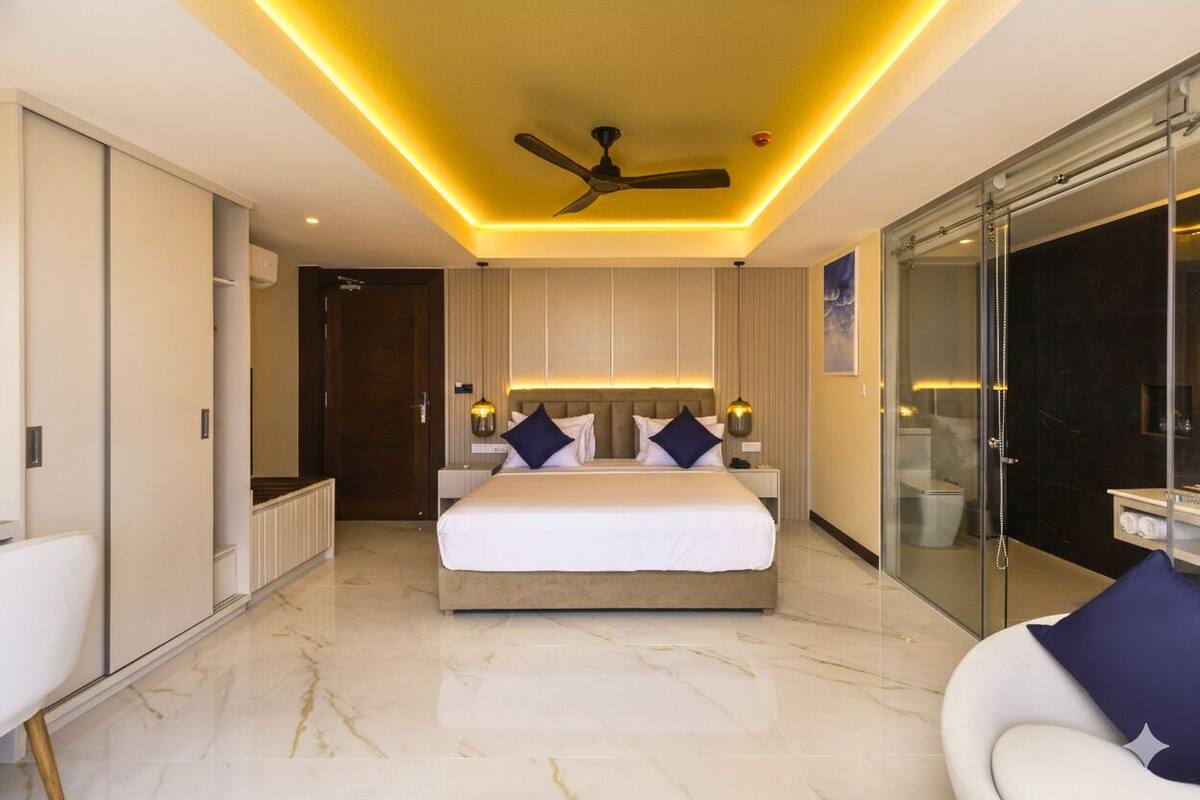 Deluxe Ocean View Room | In-room safe, desk, laptop workspace, iron/ironing board