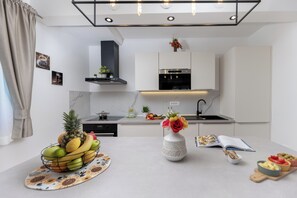 Fridge, microwave, dishwasher, coffee/tea maker