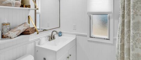 Hair dryer, towels, soap, toilet paper