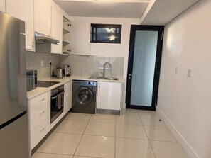 Apartment, Balcony | Private kitchen - 77 on Independence Apartments (Windhoek)