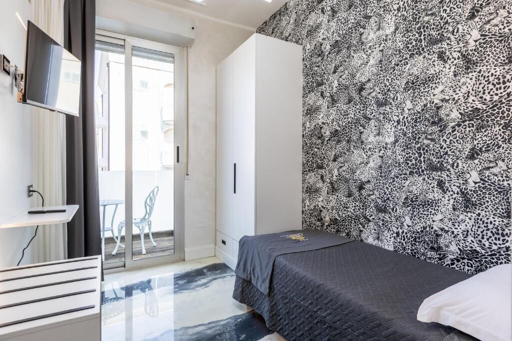 Singola Deluxe, balcone, vista mare | Una cassaforte in camera, Wi-Fi gratuito