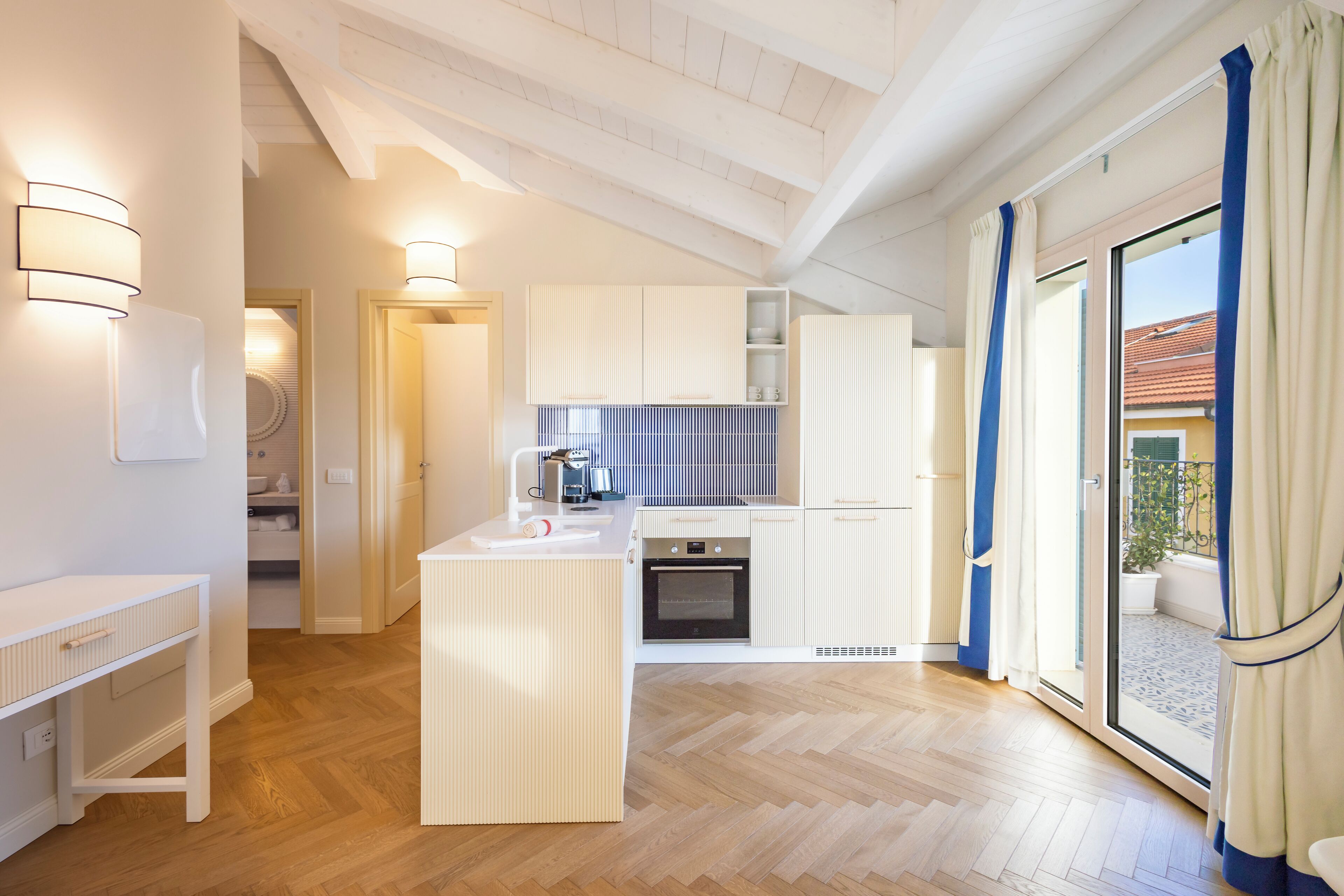 Panoramic Penthouse, Balcony, Sea View (Oltremare) | Private kitchen | Full-sized fridge, stovetop, high chair, cookware/dishes/utensils