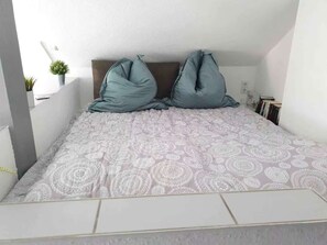 Bedroom - Loft with Fireplace – a Charming and Unique Apartment (Karlsdorf-Neuthard)